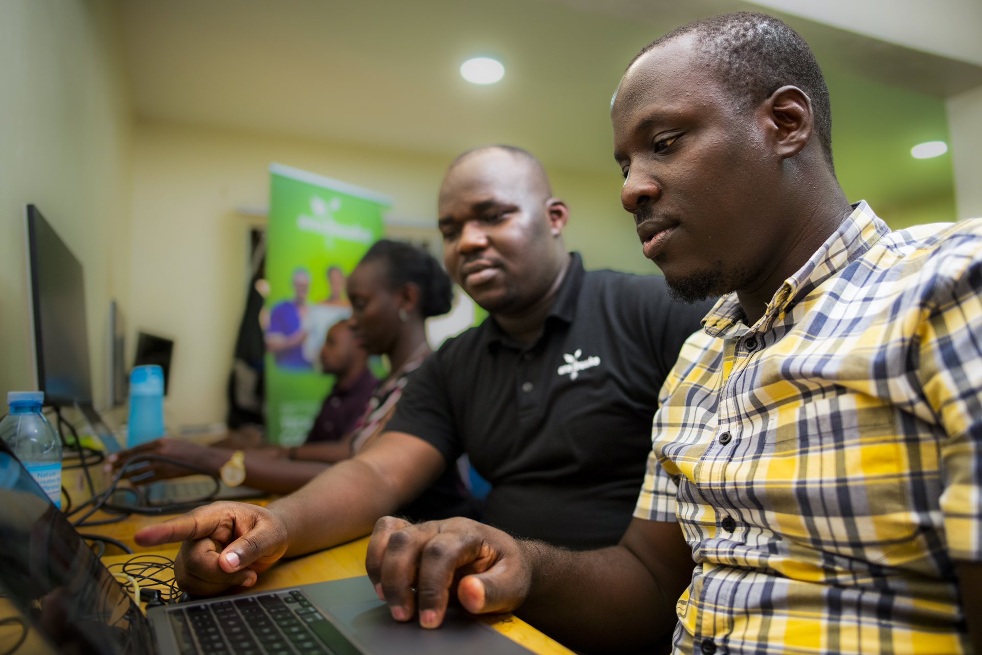Business owners at work in an MMOF portfolio company